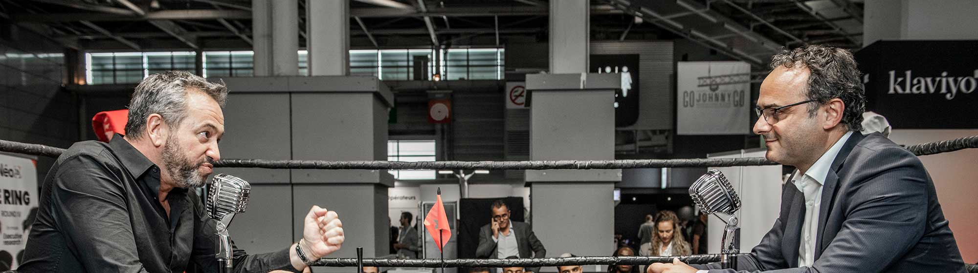 journalist and a guest during an interview at the Ring