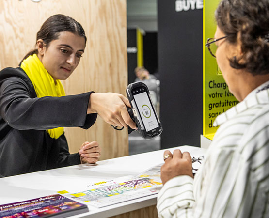 Hostess scanning a ticket